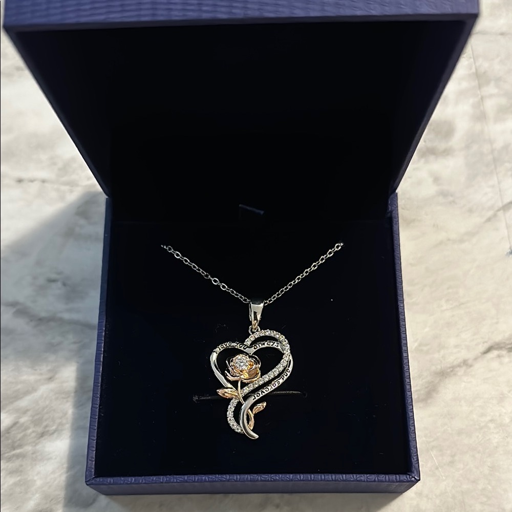 Elegant Gold and Silver Pendant Necklace